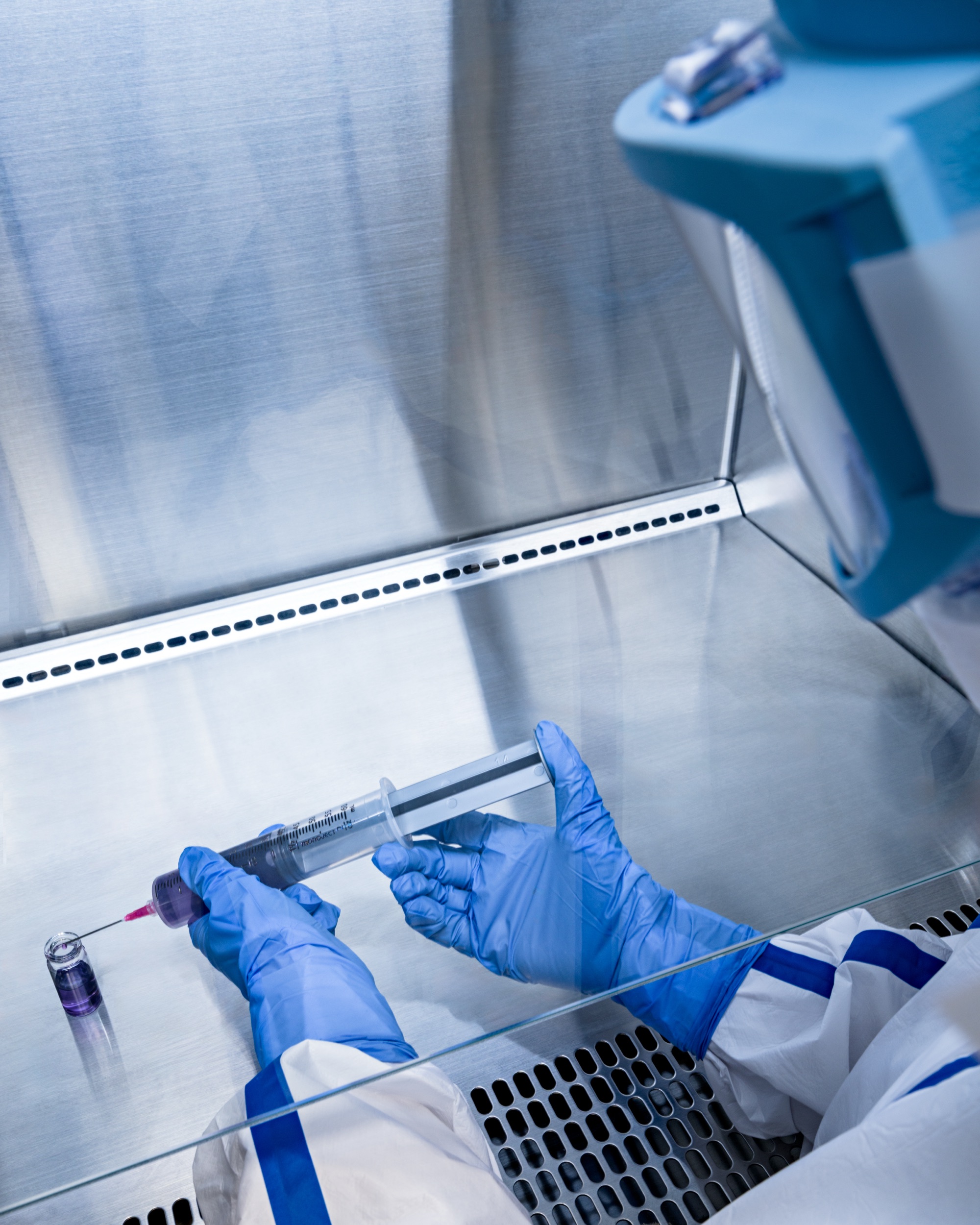 Sterile compounding inside a laminar-flow hood at AOM